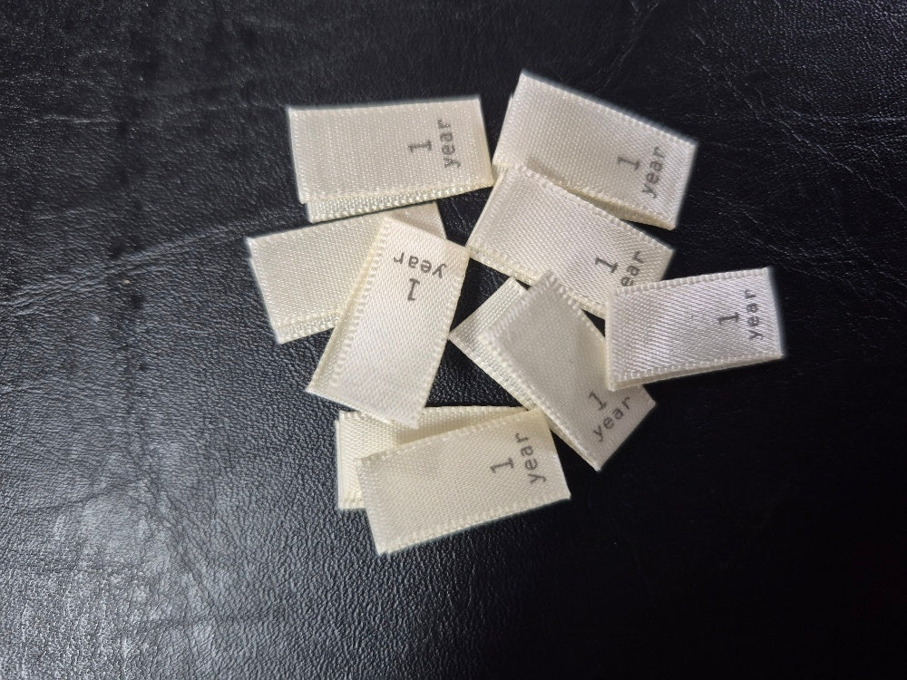 Cream Satin Labels with Brown Text- Size 1 Year
