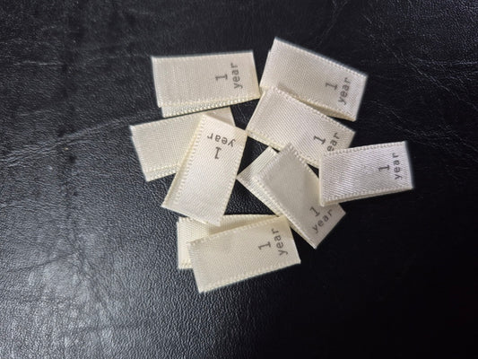 Cream Satin Labels with Brown Text- Size 1 Year