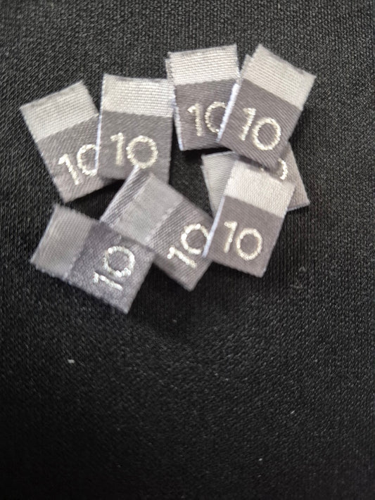 Grey with Metallic Silver text Woven labels Size 10