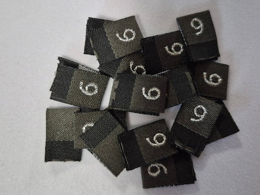 Dark Grey with Metallic Silver text Woven Labels Size 6